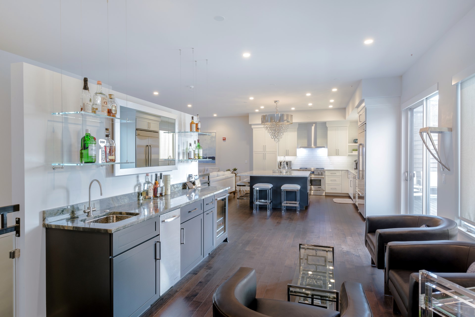 Painted kitchen with a matching bar, built by Trillium for the Park Avenue project