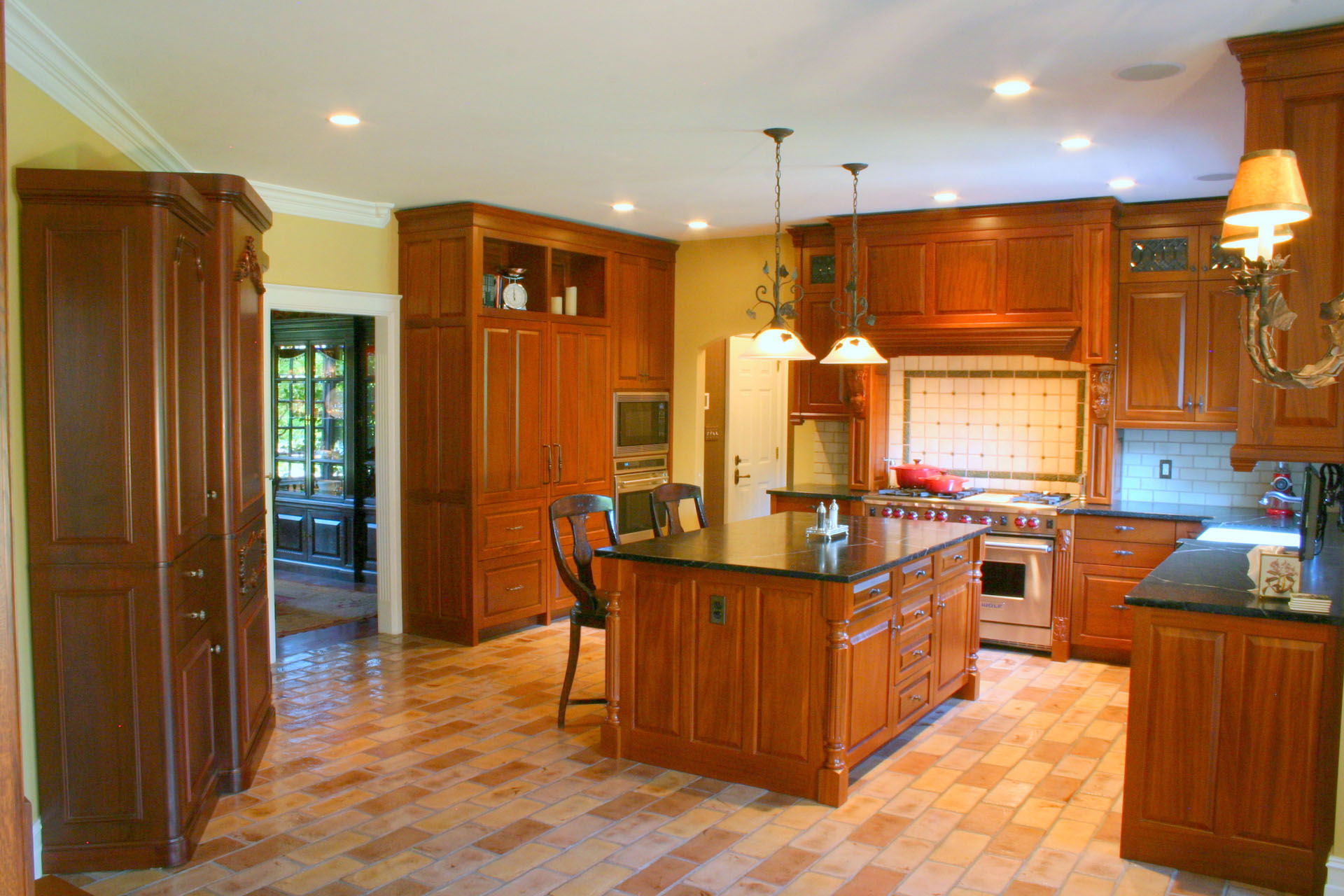 Art Nouveau mahogany kitchen cabinetry, built by Trillium for the Woodfield project